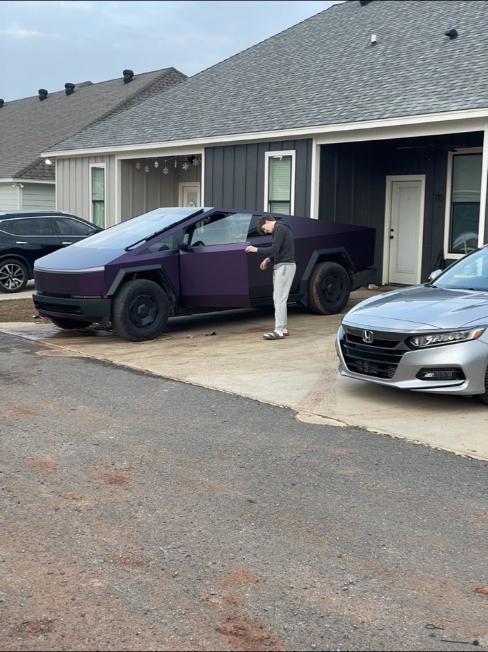 Deep purple wrapped Tesla Cybertruck